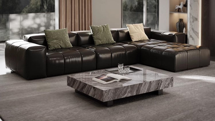Minimalist sofas avoid unnecessary ornamentation and focus on smooth silhouettes.
