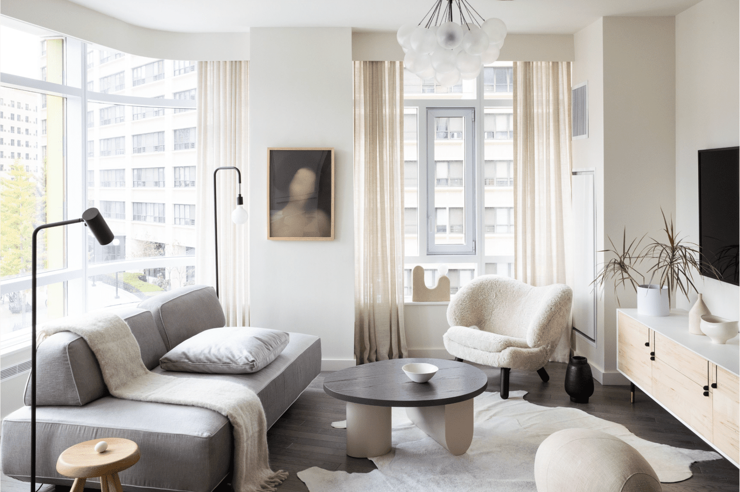Strategic lighting and reflective surfaces can significantly enhance the perception of space, making a small apartment feel much larger, airier