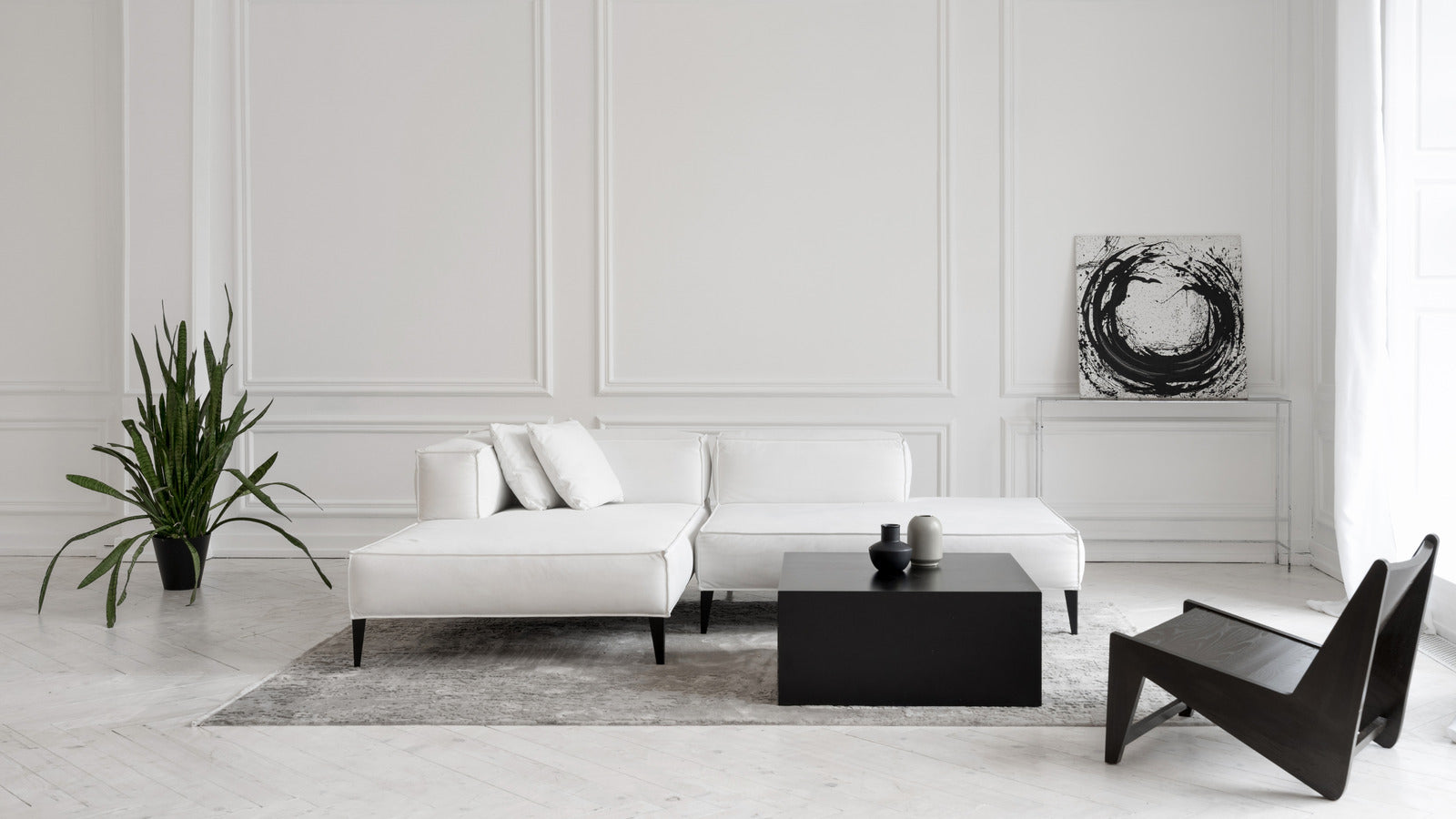 Clean lines, tapered legs, and neutral tones make it a sleek choice for contemporary homes.