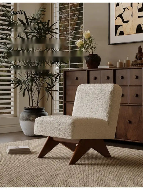 SMALL HIBISCUS Chandigarh Armless Sofa Chair from SMALL HIBISCUS