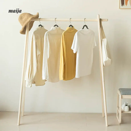 Anderson Cherry Wood Clothing Rack from maija