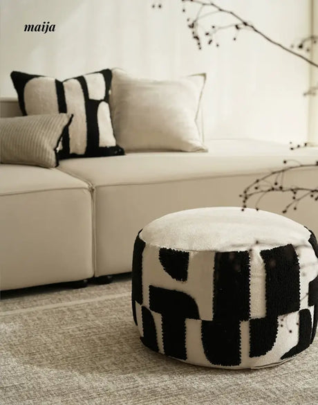 BACKTOBUTU Black and White Geometric Pouf from maija