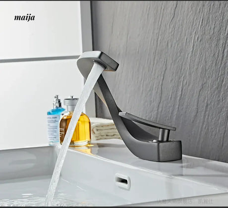 Creative Curve Copper Basin Faucet from Kaiyashi