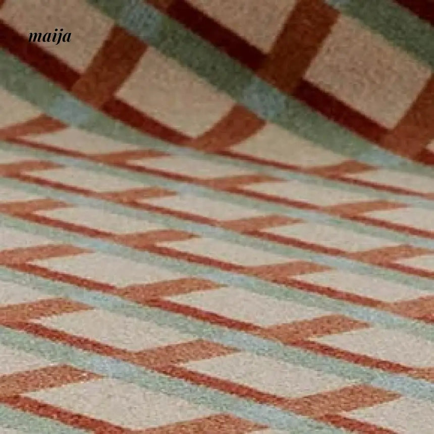 TIPTOE Dark Island Rug from TIPTOE
