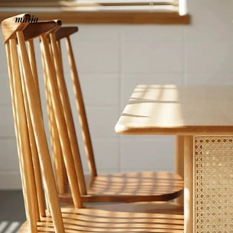 SLIGHTLYCOOL Mattie Rattan Dining Table from maija