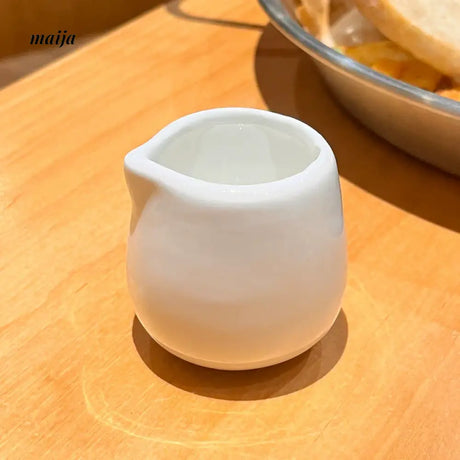BANKE Ceramic Milk Jar and Condensed Milk Spoon from BANKE