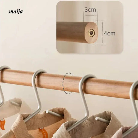 Anderson Cherry Wood Clothing Rack from maija