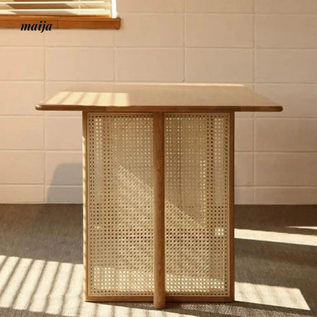 SLIGHTLYCOOL Mattie Rattan Dining Table from maija