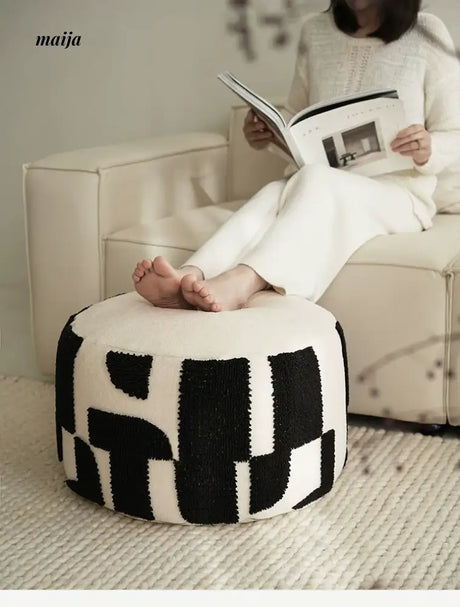 BACKTOBUTU Black and White Geometric Pouf from maija