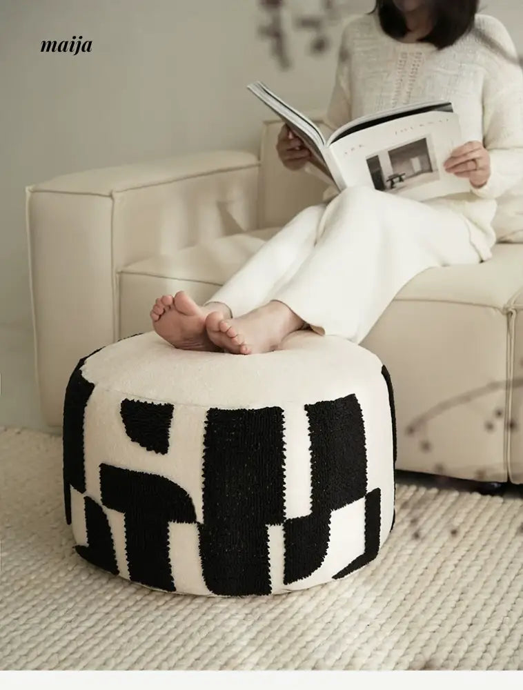 BACKTOBUTU Black and White Geometric Pouf from maija