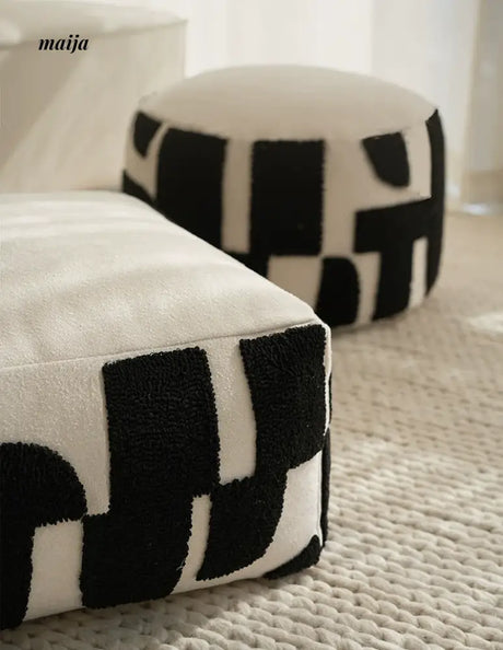 BACKTOBUTU Black and White Geometric Pouf from maija