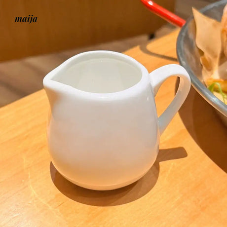 BANKE Ceramic Milk Jar and Condensed Milk Spoon from BANKE