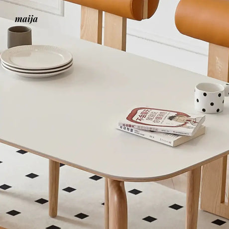 DOSMARS Ella Creamy Elephant Leg Dining Table from DOSMARS