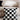 MISTYWOOD Black and White Grid Pattern Pillow from MISTYWOOD