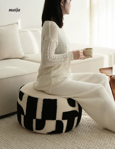 BACKTOBUTU Black and White Geometric Pouf from maija