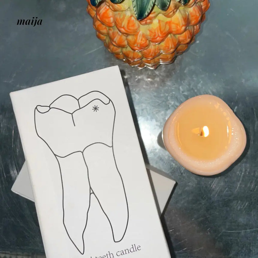 Happy Tooth Candle from uncle carpenter