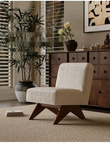 SMALL HIBISCUS Chandigarh Armless Sofa Chair from SMALL HIBISCUS