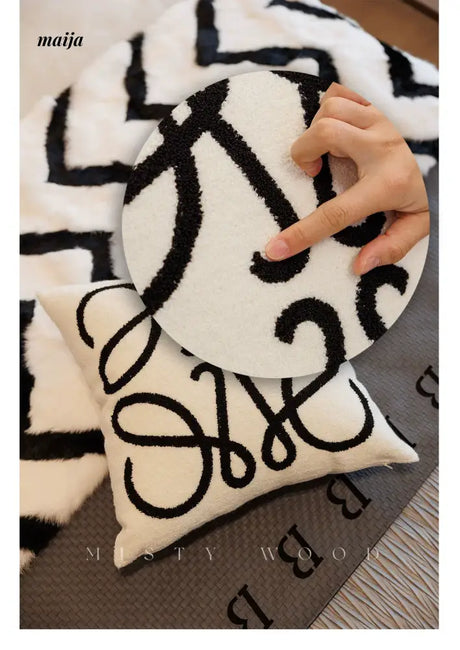 MISTYWOOD Black and White Grid Pattern Pillow from MISTYWOOD