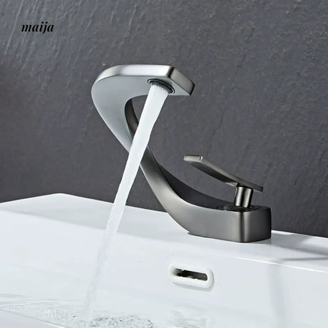 Creative Curve Copper Basin Faucet from Kaiyashi