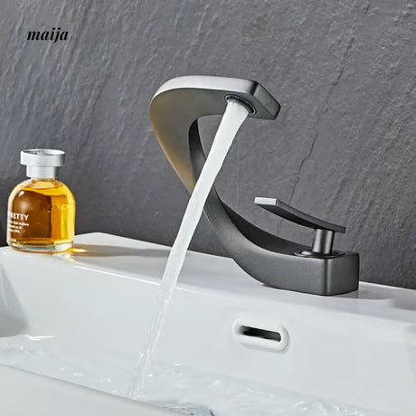 Creative Curve Copper Basin Faucet from Kaiyashi