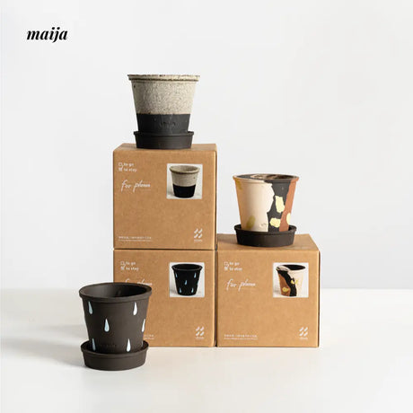 CIIREALS Sprinkle Cake Ceramic Planter from maija