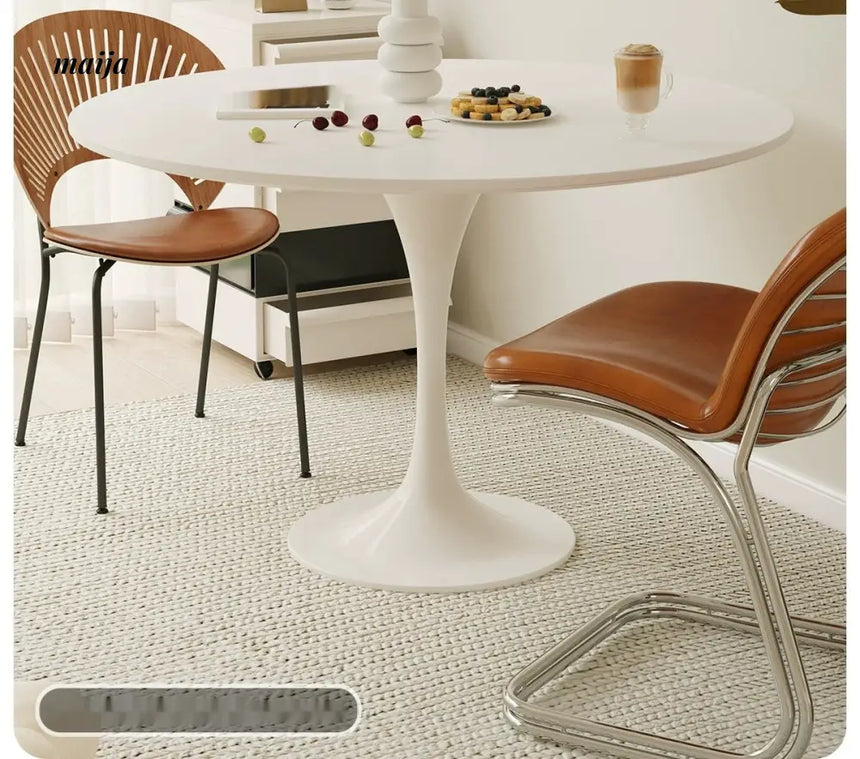 LOWERLEFT Tulip Round Dining Table from Lower Left