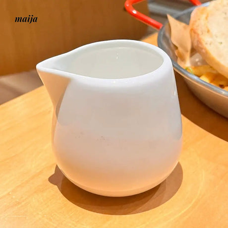BANKE Ceramic Milk Jar and Condensed Milk Spoon from BANKE