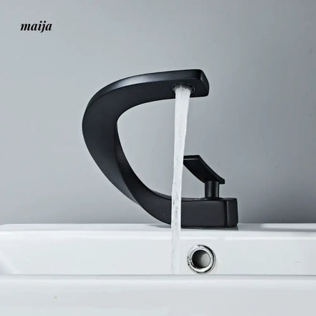 Creative Curve Copper Basin Faucet from Kaiyashi