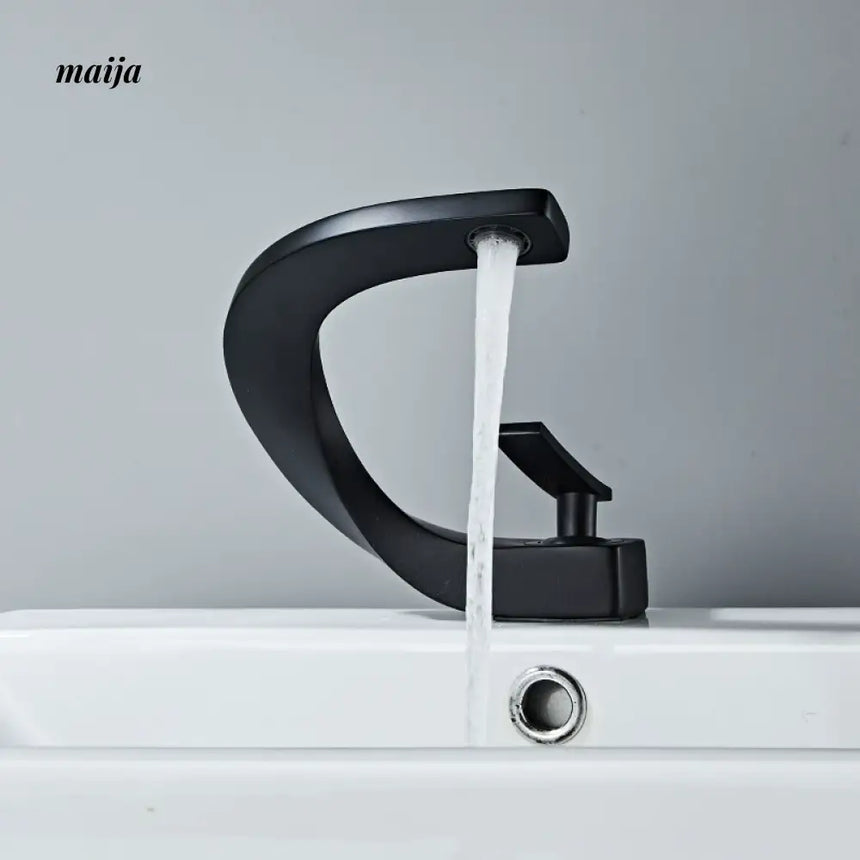 Creative Curve Copper Basin Faucet from Kaiyashi