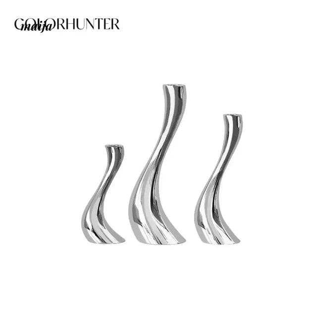COLOURHUNTER Modern Metal Candle Holder from maija