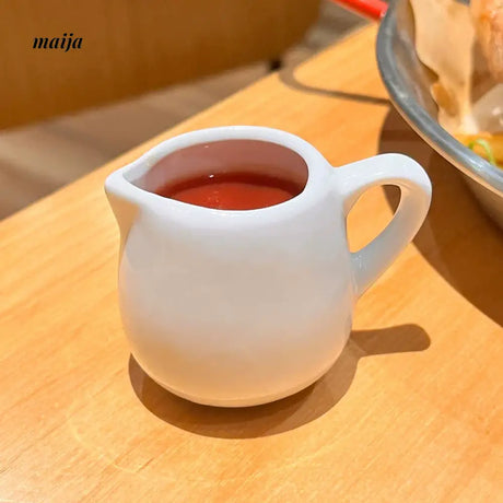 BANKE Ceramic Milk Jar and Condensed Milk Spoon from BANKE