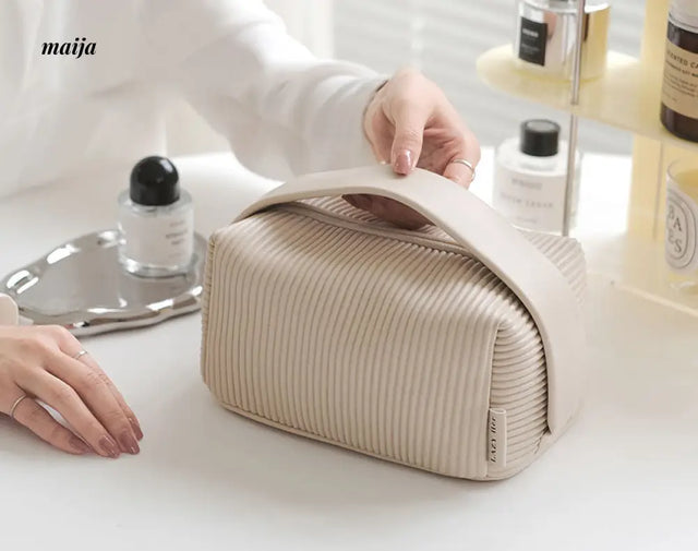 Ribbed Travel Cosmetic Bag from maija