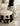BACKTOBUTU Black and White Geometric Pouf from maija