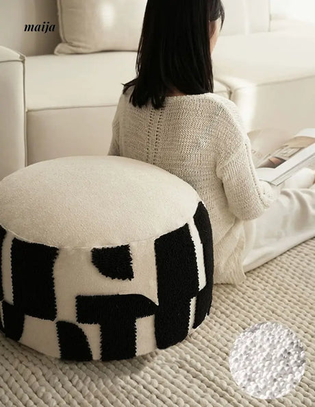BACKTOBUTU Black and White Geometric Pouf from maija