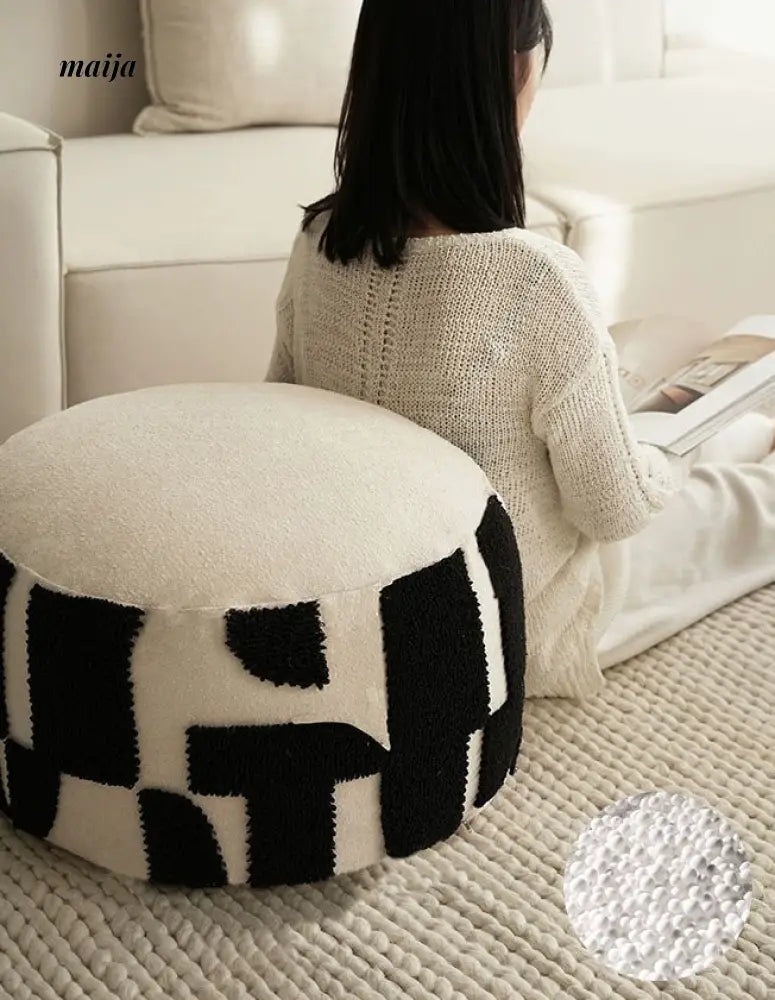 BACKTOBUTU Black and White Geometric Pouf from maija