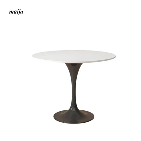 LOWERLEFT Tulip Round Dining Table from Lower Left