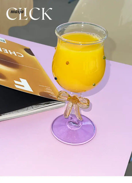 CLICK Handmade Glass Bow Champagne Goblet from CLICK