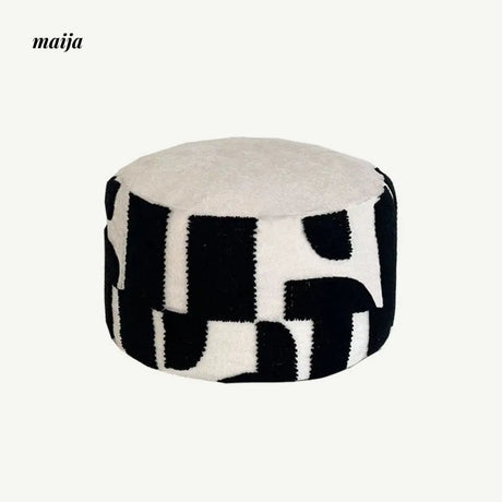 BACKTOBUTU Black and White Geometric Pouf from maija