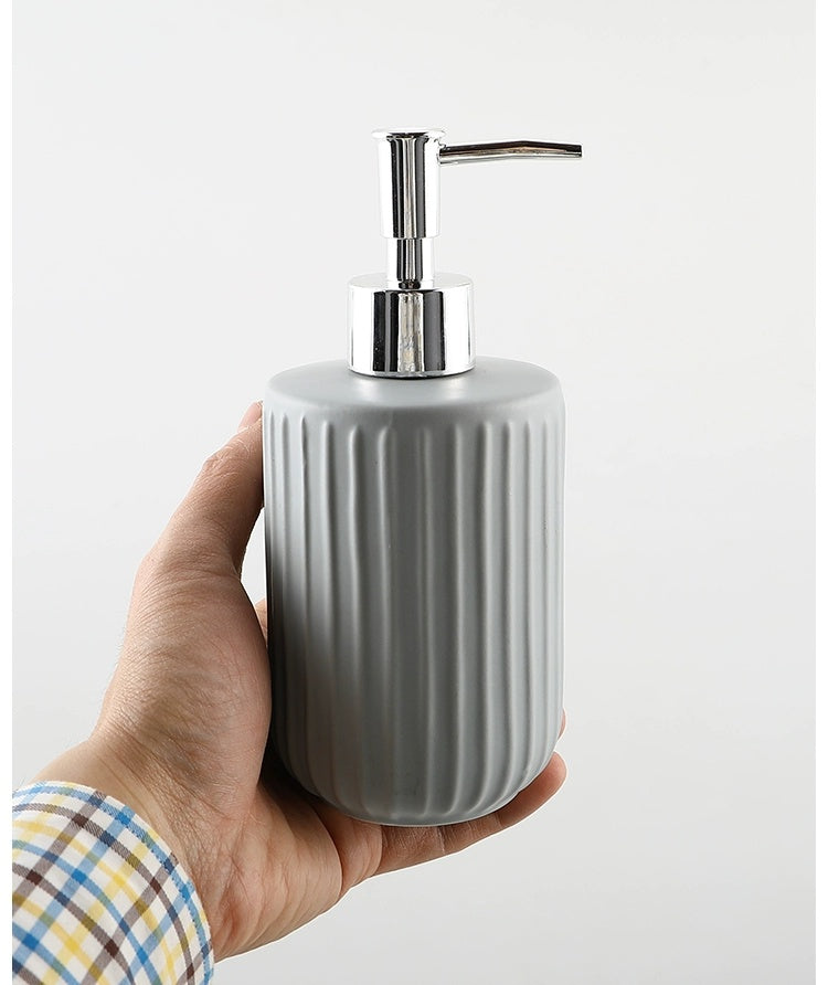 KULE HOME Stripe Ceramic Lotion and Hand Soap Bottle from KULE HOME