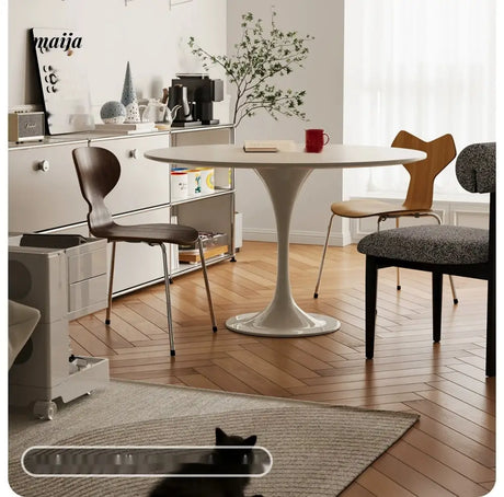 LOWERLEFT Tulip Round Dining Table from Lower Left