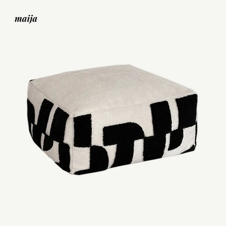 BACKTOBUTU Black and White Geometric Pouf from maija
