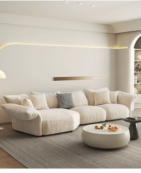 LATE AUTUMN Classic Cream Sofa with Elegant Details from LATE AUTUMN