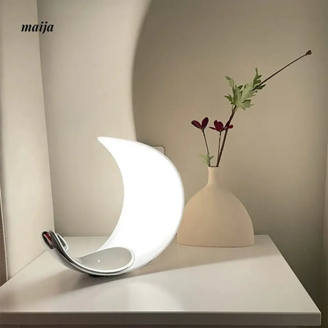 Lunar Curve Table Lamp from maija