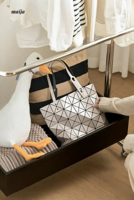 Elana Coat Hanger with Storage from maija