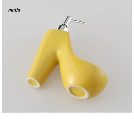 KULE HOME Ceramic Lotion Bottle and Sponge Base from KULE HOME