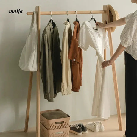 Anderson Cherry Wood Clothing Rack from maija