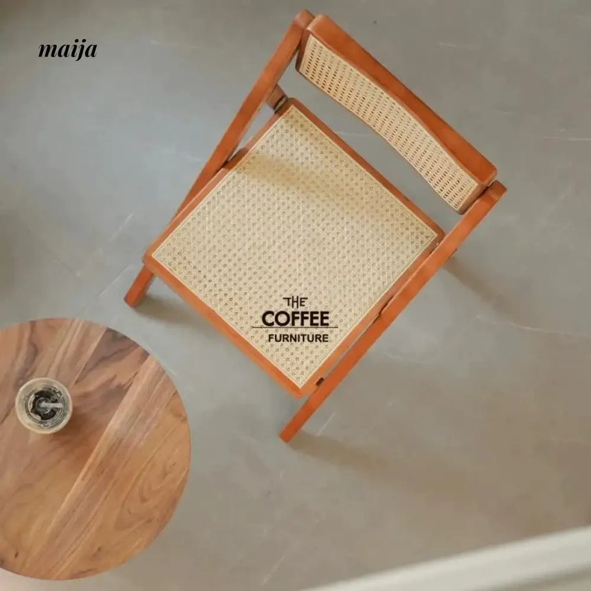 THECOFFEEFURNITURE Foldable Rattan Chair from maija