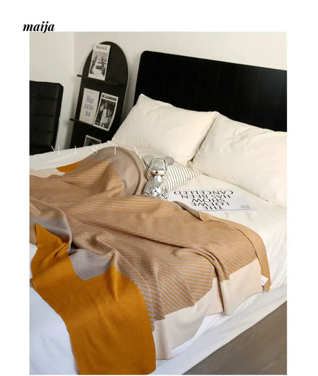 MISTYWOOD Knitted Blanket with Pastel Stripes from MISTYWOOD