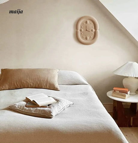 Fuzzy Oval Wall Clock from maija