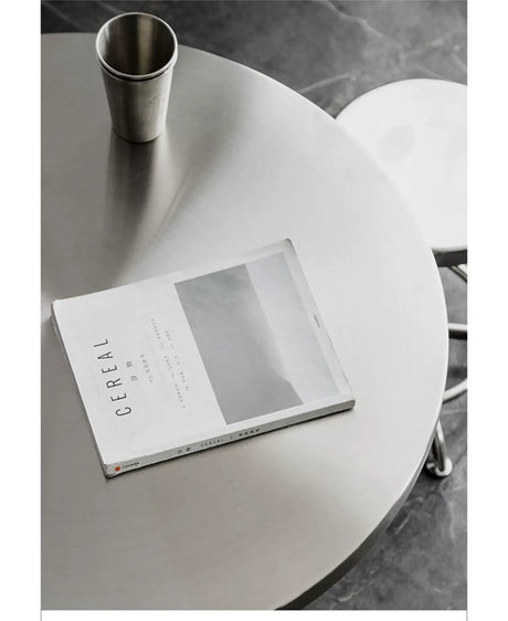 ABOUT WHITE Elowen Sleek Stainless Steel Outdoor Table from ABOUT WHITE